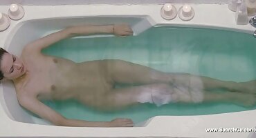 ຊິລິໂຄນ babe fucked ໂດຍໄປສະນີ. ໃນຫຼັກຊັບ erotic ສີດໍາ.